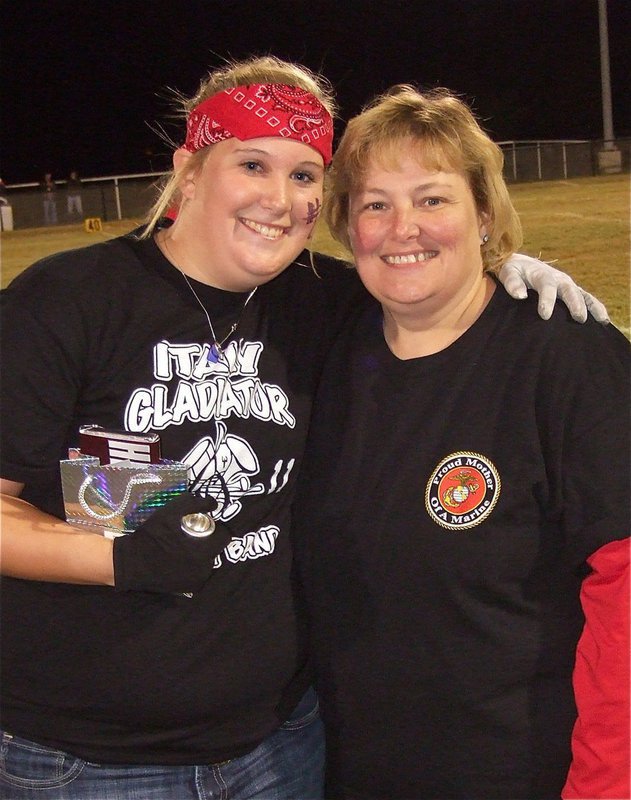 Image: Gladiator Regiment Marching Band senior drum major, Drenda Burk, is ready to end her final home game with an amazing performance.
