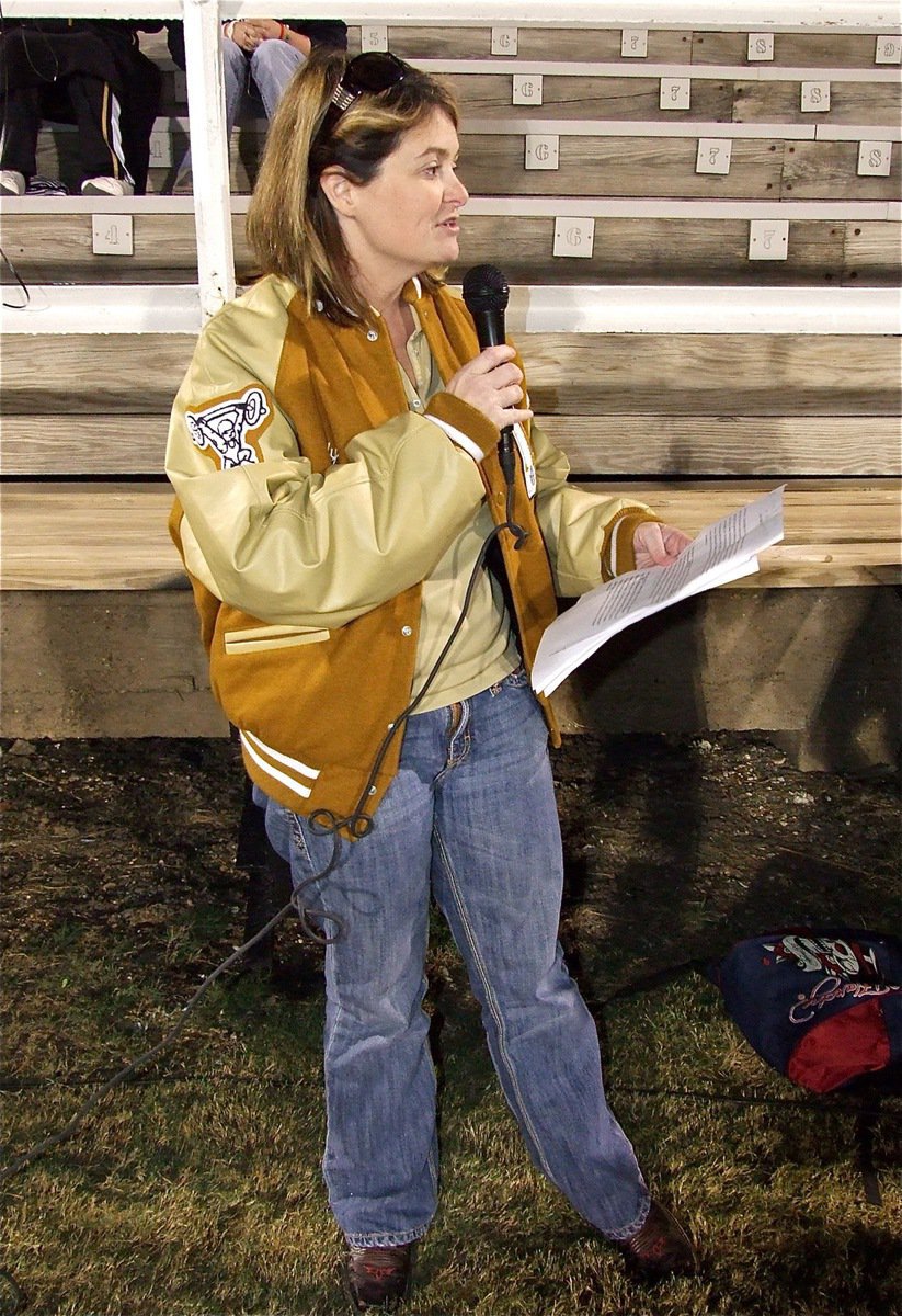 Image: Celebrating Senior Night at Willis Field, Tanya Snook who is the Director of Curriculum and Instruction, Federal Programs and Testing at Italy High School, introduces the senior class along with their escorts and reads individual farewell statements submitted by each senior before the game.