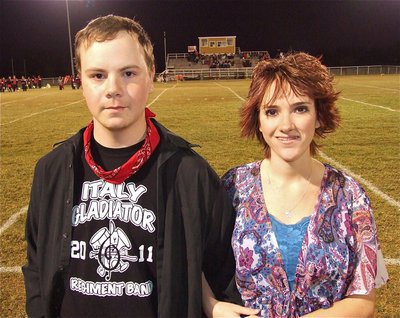 Image: Senior Gladiator Regiment Band Members, Nolan Griffith, and, Andrea Lanning, are introduced during the pre-game.