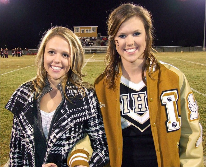 Image: Kaitlyn Rossa, a senior, shares the moment with her sister, Ashlyn Rossa.