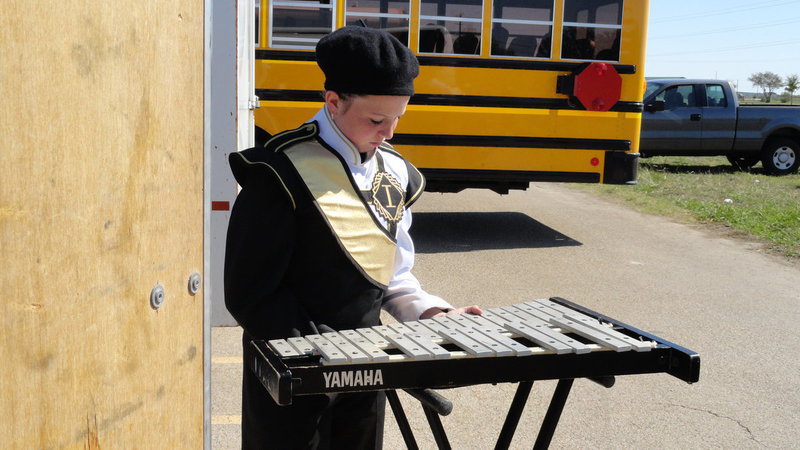 Image: Maddie Pittman sets up the xylophone.