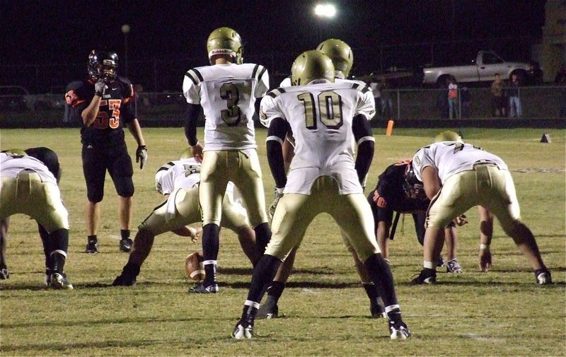 Image: Backed up on their side of the field, Jase Holden(3) and the Gladiators try to mount a game-winning drive.