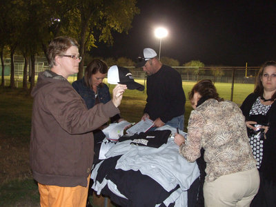 Image: Dee Dee Hamilton checks out the fashion sale at the bonfire.