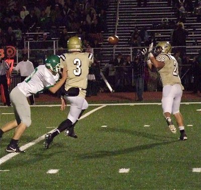 Image: Jase Holden(3) pitches to Kyle Jackson(28).