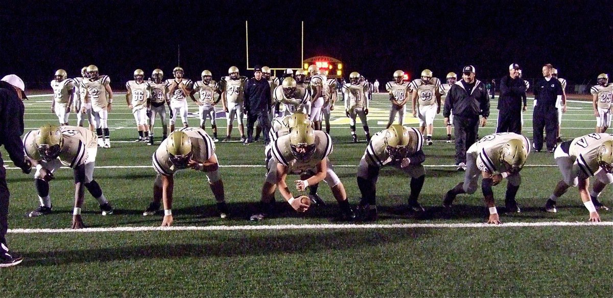 Image: Italy’s offense practices plays before the playoff game against Franklin.