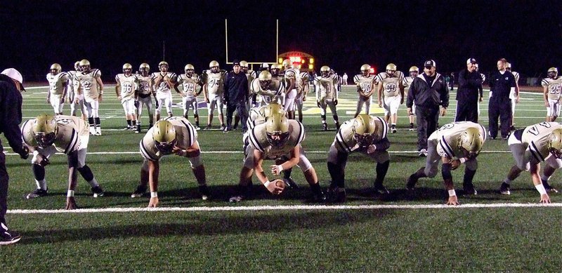 Image: Italy’s offense practices plays before the playoff game against Franklin.