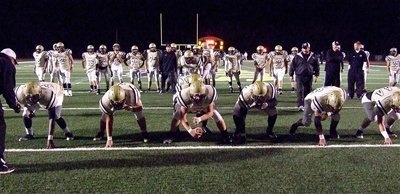 Image: Italy’s offense practices plays before the playoff game against Franklin.