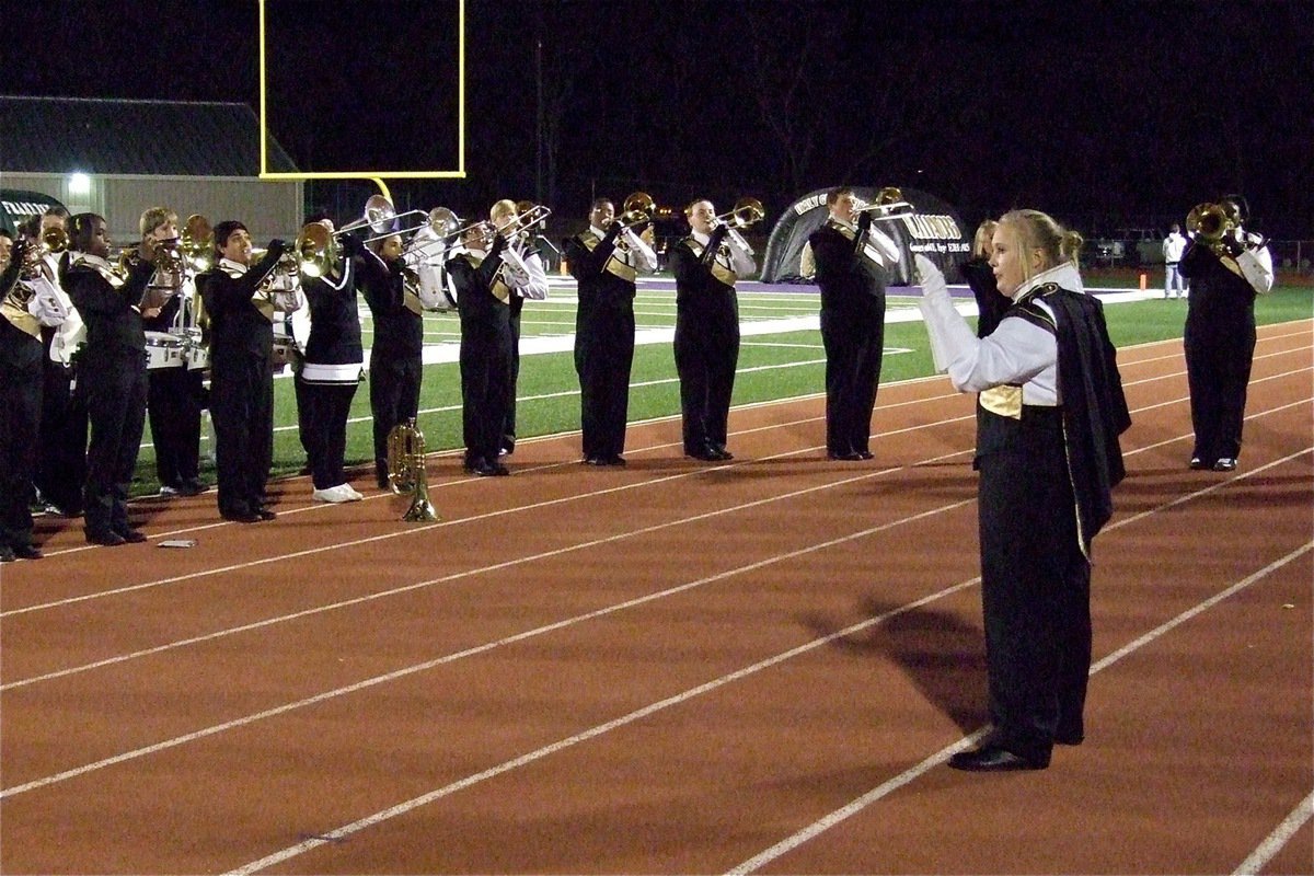 Image: Gladiator Regiment Band drum major Drenda Burk leads her talented troops.