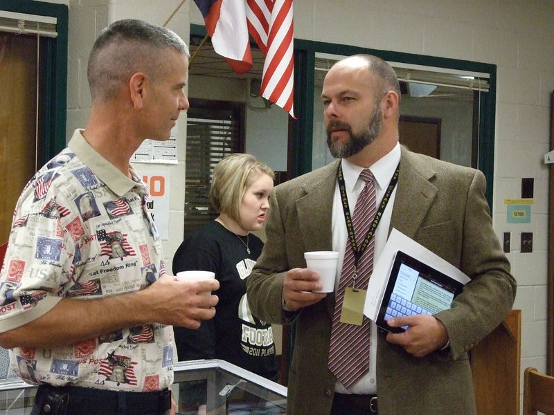 Image: Wesley Westbrook visits with Lee Joffre in the library on Veteran’s Day.