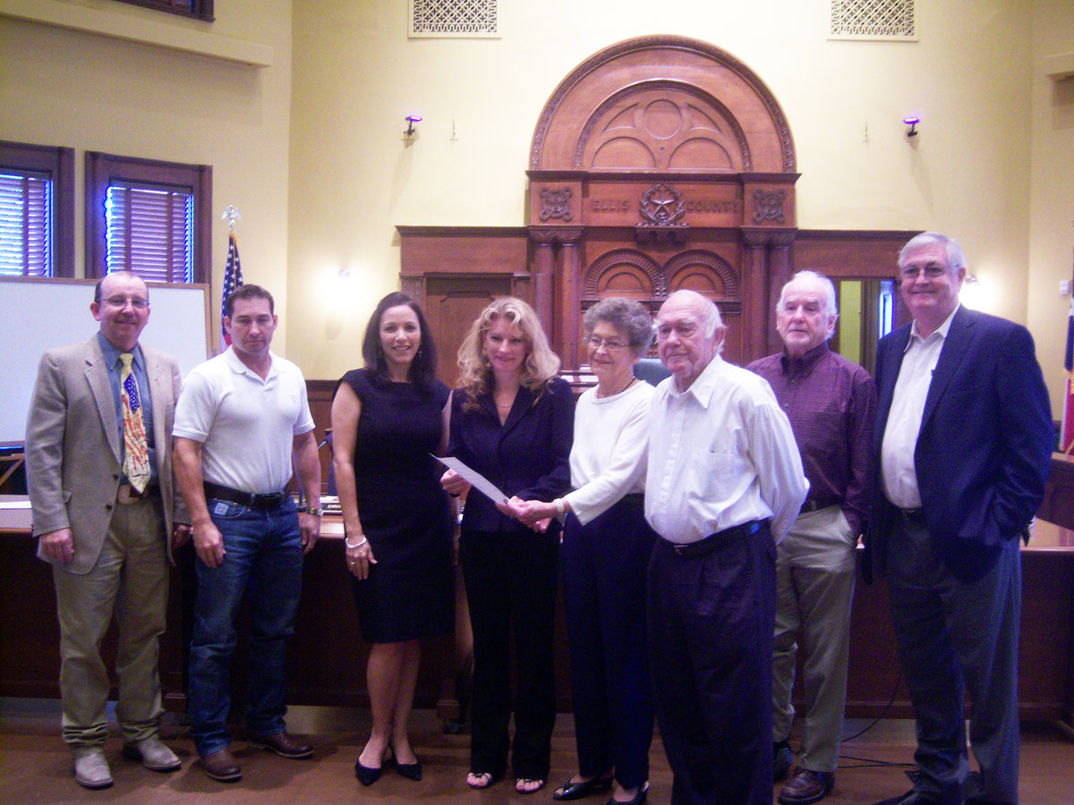 Image: Bertha and Julius Podhrasky and their granddaughter, Tricia Hambrick, were present to receive the Court’s proclamation.