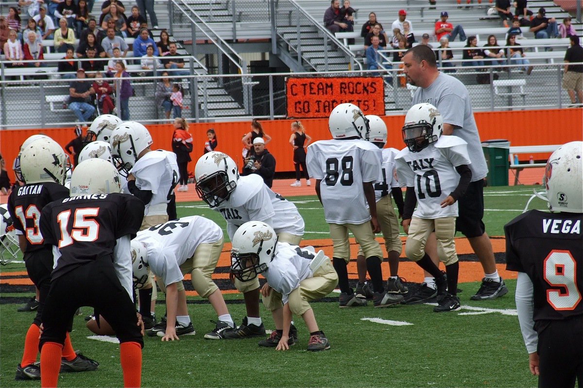 Image: Coach Itson breaks the huddle with his troops.