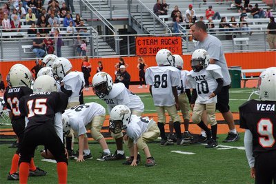 Image: Coach Itson breaks the huddle with his troops.