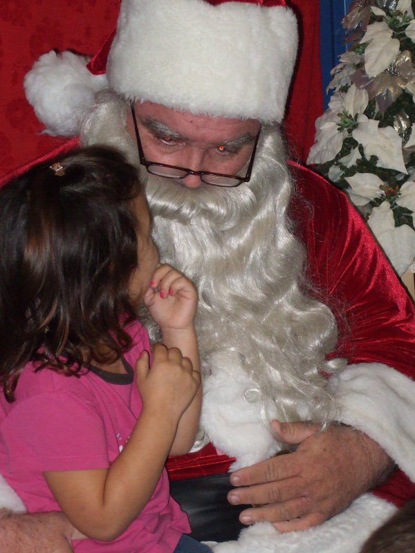 Image: Christmas secrets are being told to Santa.