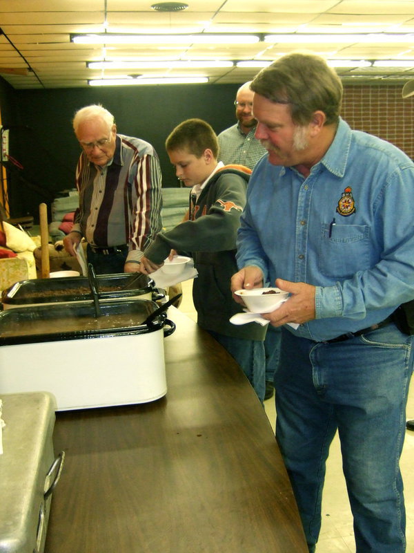 Image: Lined up for some good chili and beans.