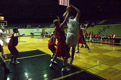 Image: Sophomore Kevin Roldan(21) provided valuable minutes off the bench against Axtell and wasted no time putting points on the board after coach Josh Ward sent him in.