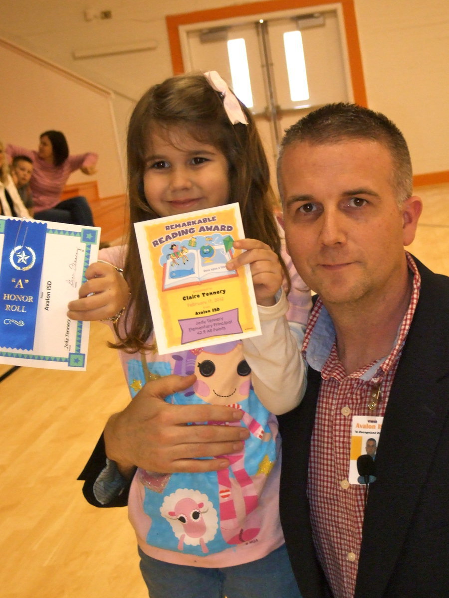 Image: Claire Tennery made the A honor roll and and award for reading too!