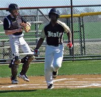 Image: Italy’s leadoff hitter Marvin Cox(1) walks after his first at bat of the season in Palmer. Cox would eventually score to account for the only run of the game. 