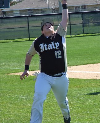 Image: Third baseman John Byers(12) scrambles after a foul ball.