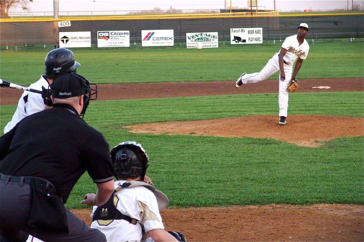 Image: Marvin Cox(1) retakes the mound at home against Maypearl with teammate John Escamilla(3) behind the plate.