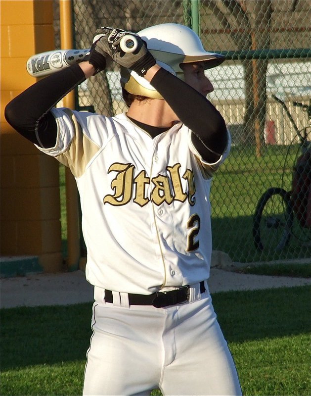 Image: Chace McGinnis(2) helps his JV teammates get into the swing of things as Italy opens district play with a win over Axtell.