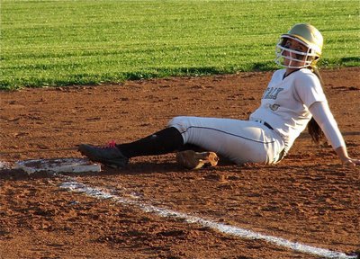 Image: Alyssa Richards beats the throw to third base.
