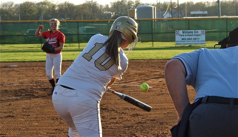 Image: Paige Westbrook(10) moves the runners after digging out a hit.