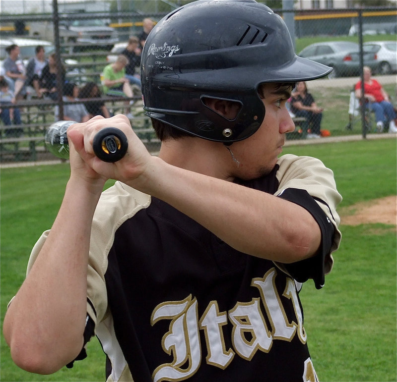 Image: Italy’s Tyler Anderson gets loose in the batter’s circle.