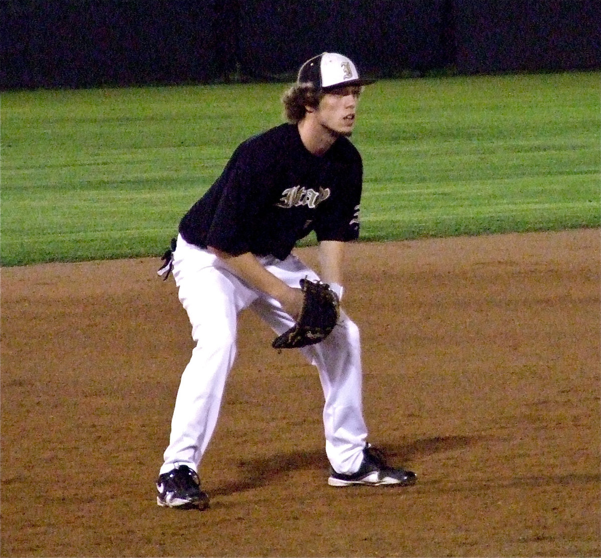 Image: Senior Brandon Souder was a busy Gladiator on Friday knocking down hit-after-hit at third base in Grandview.
