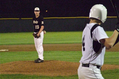 Image: Italy’s senior pitcher Justin Buchanan(13) takes on a Grandview batter.