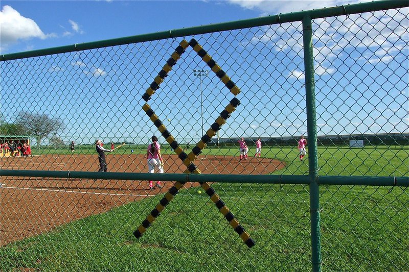 Image: The Lady Gladiators pink-out on Wednesday to help “Strikeout Cancer.”