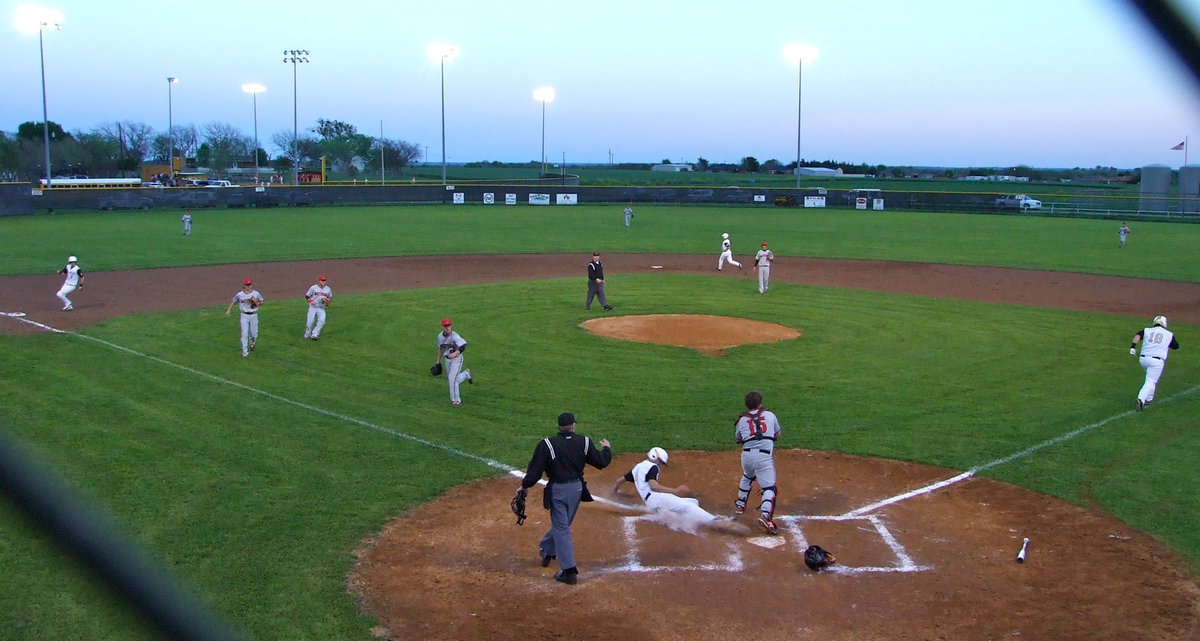 Image: DeMoss slides in but the Panthers got him at home.