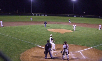Image: Jase puts a score on the board in the bottom of the 4th inning.