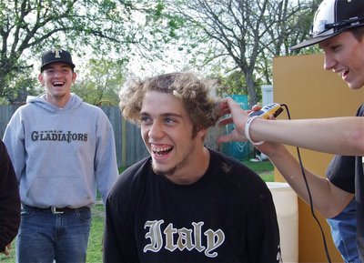 Image: Brandon Sounder, Zackery Boykin and Alex DeMoss have a laugh when someone in the crowd yells, “Leave it just like that!”