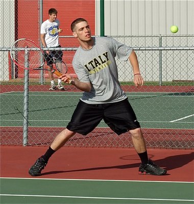 Image: Italy’s Brandon Souder goes off court to return the favor.