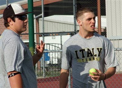 Image: Doubles partners Kevin Roldan and Brandon Souder ensure they’re on the same page with regard to their Rice Bulldog opponents.