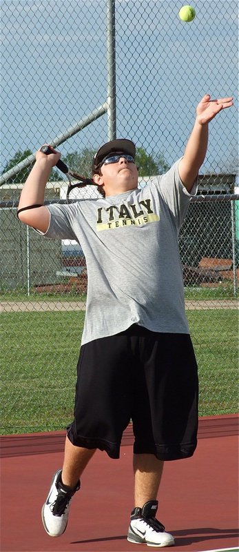 Image: Italy’s Kevin Roldan prepares to serve.