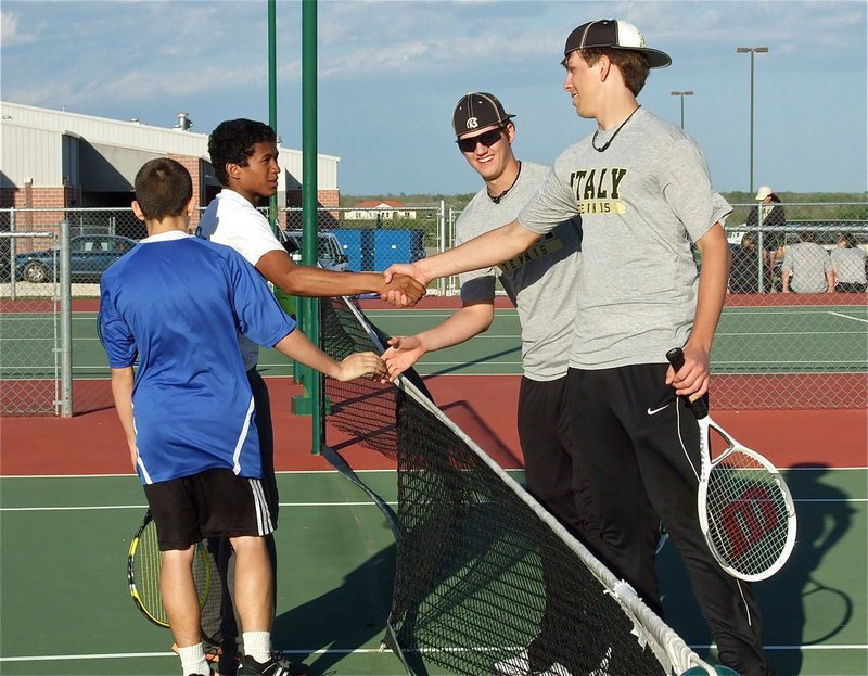 Image: Italy’s Jase Holden and Cole Hopkins congratulate their RIce opponents on a spirited match.