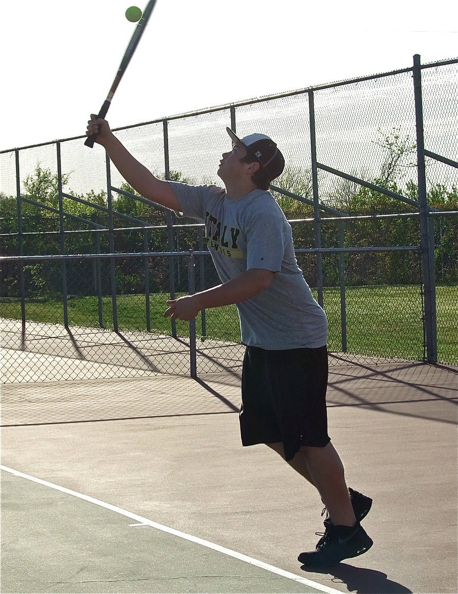 Image: Italy’s Zain Byers gives a valiant effort during his singles matchup.