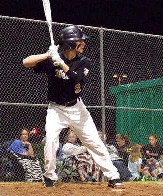 Image: Caden Jacinto tries to put the game away by hitting the long ball.