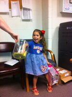 Image: Adela Garcia draws winning name for Texas Ranger tickets.