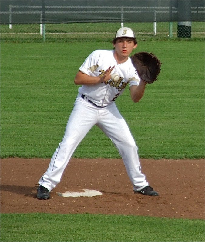 Image: JV Gladiator, Chace McGinnis(2), covers second base from his shortstop position.