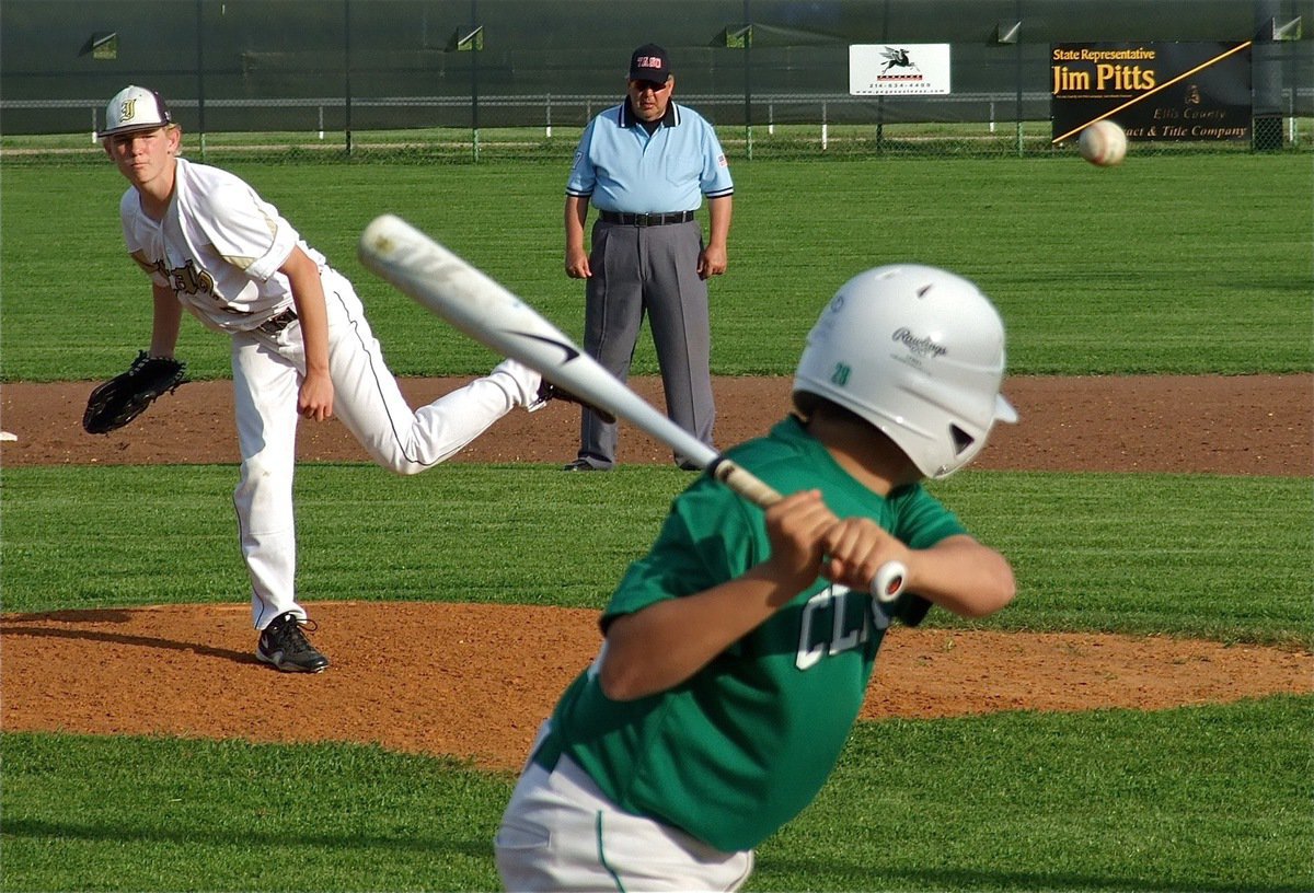 Image: Freshman pitcher, Cody Boyd steps to the mound for the JV Gladiators.