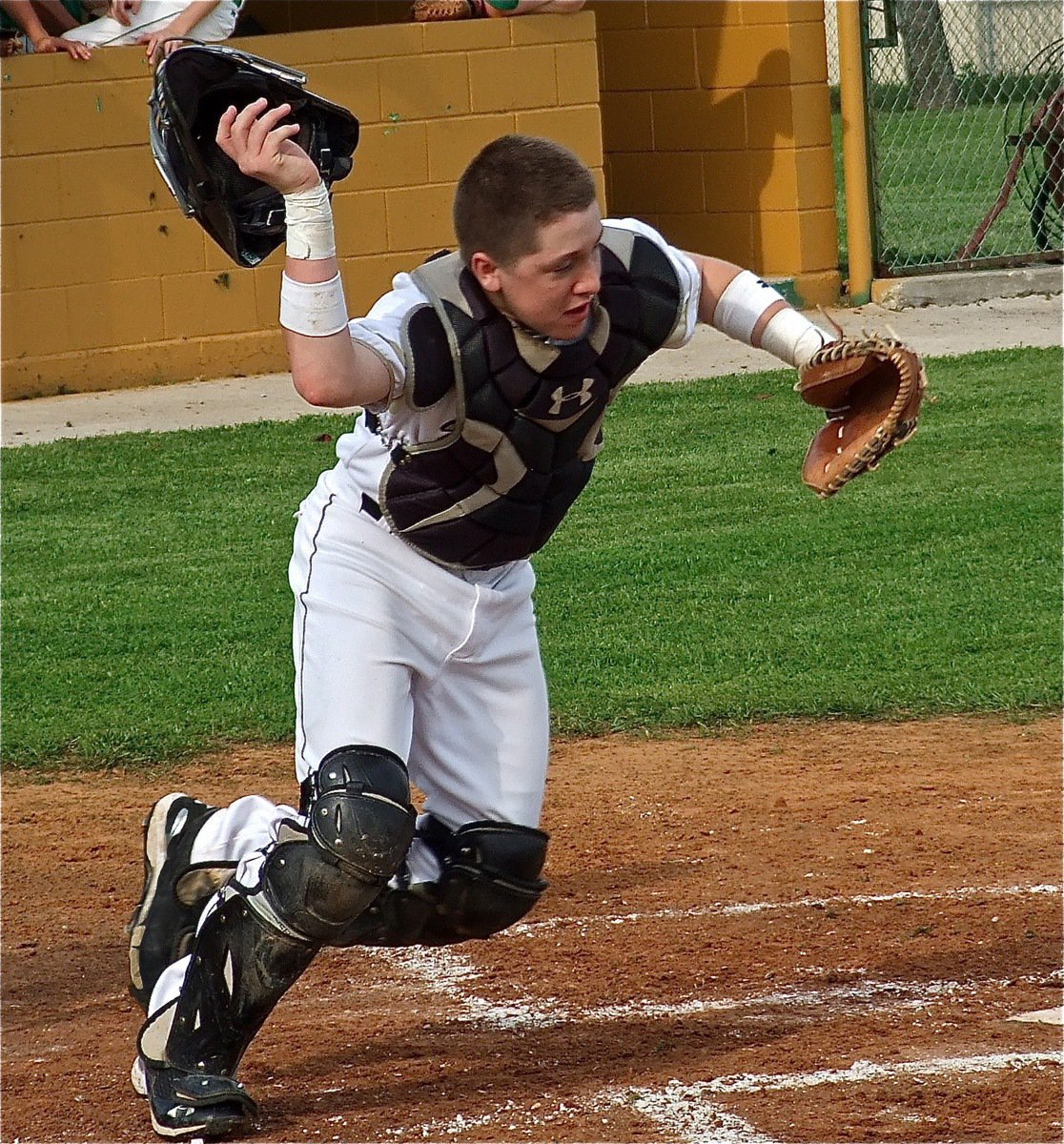 Image: JV Gladiator catcher John Escamilla charges after a bunt.