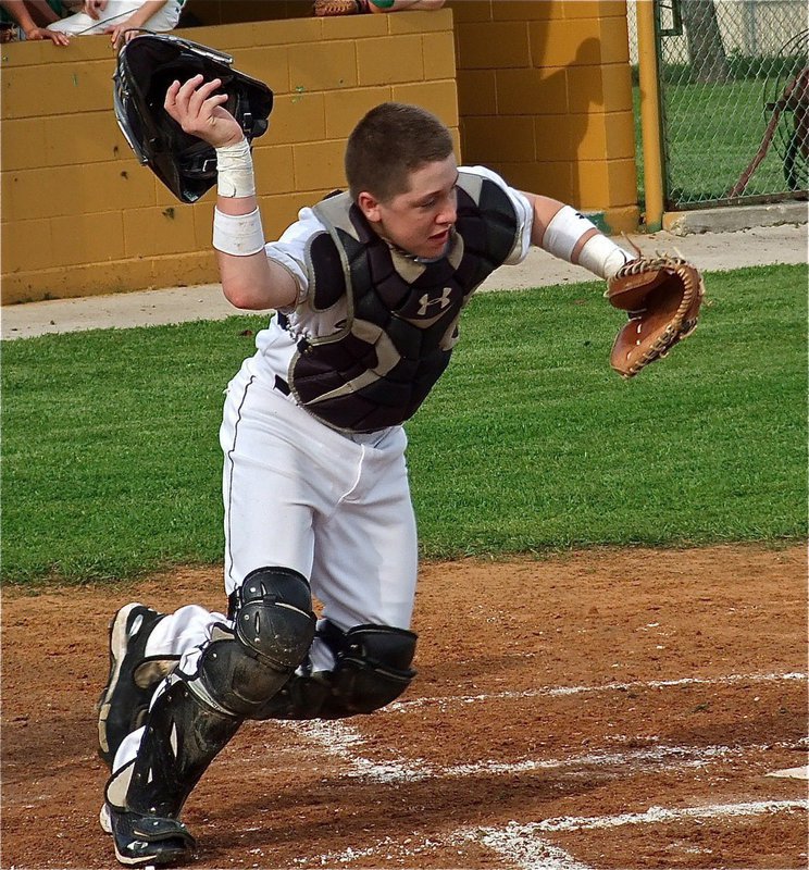 Image: JV Gladiator catcher John Escamilla charges after a bunt.