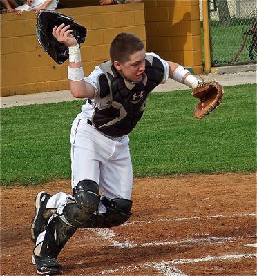 Image: JV Gladiator catcher John Escamilla charges after a bunt.