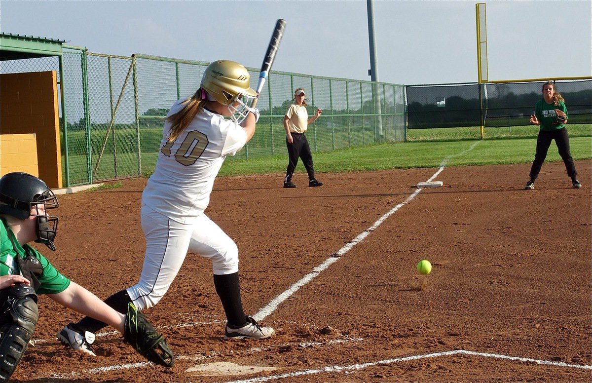Image: Italy’s Paige Westbrook(10) hits a grounder toward third base.