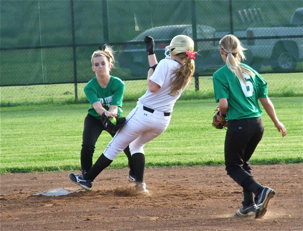 Image: Madison Washington(2) makes is safely to second base for the Lady Gladiators.