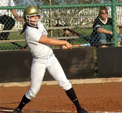 Image: Italy senior, Megan Richards(17) drives a shot into right field.