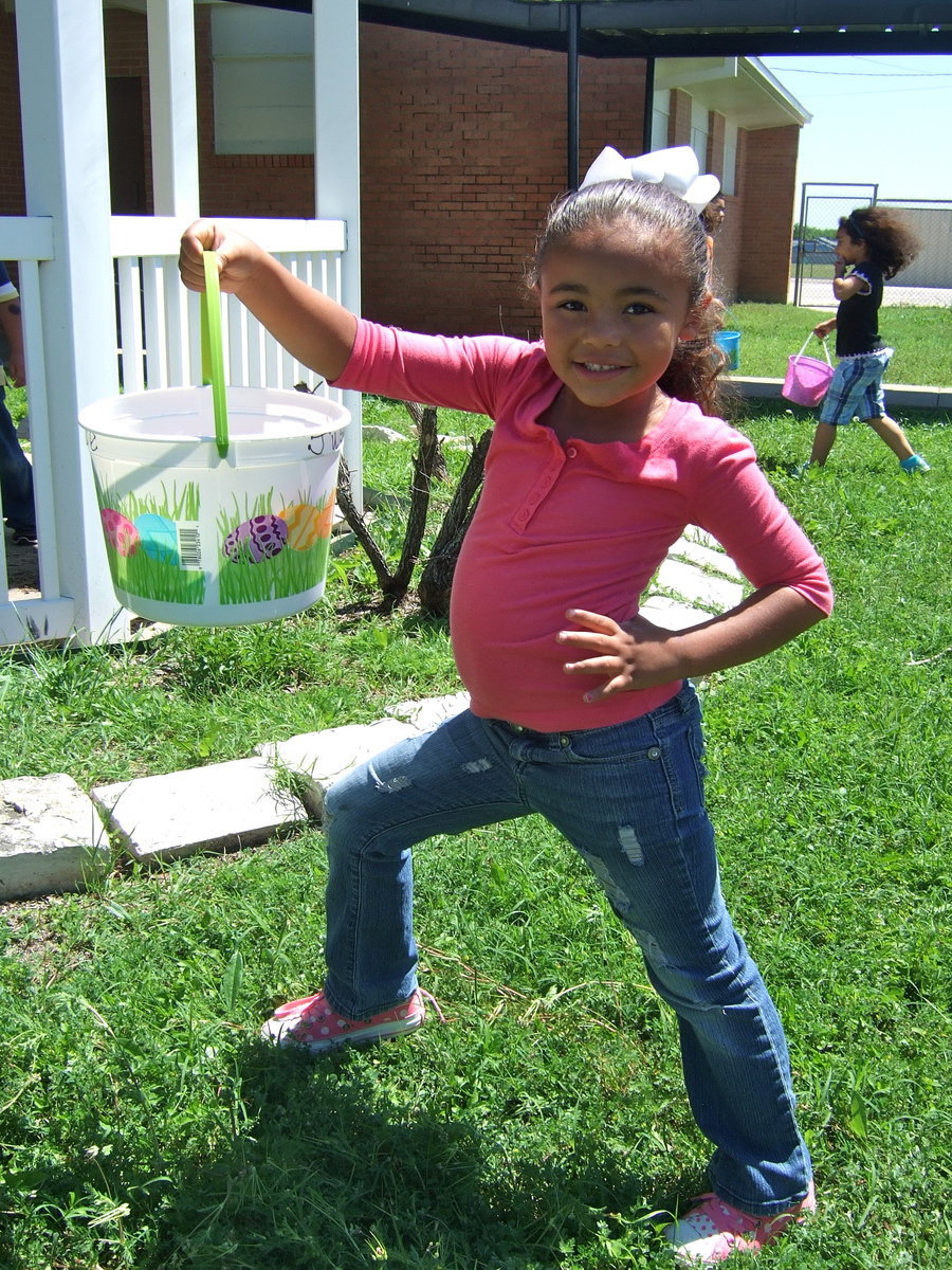 Image: Justice Shelby has posed too prettily for her picture with her bucket of eggs.