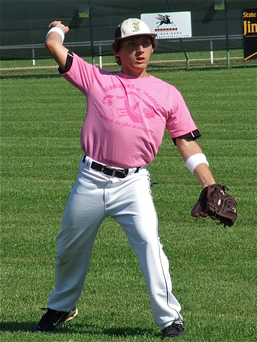 Image: Chace McGinnis warms up before the Italy JV Gladiators battle Hubbard and cancer.